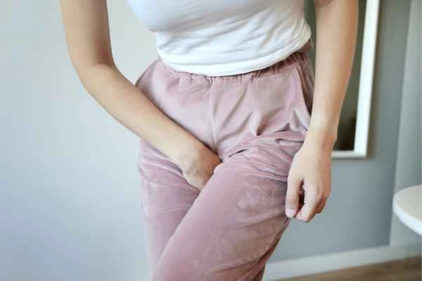 woman struggling with urine incontinence Hamilton